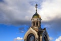 Old Christian church in Kemerovo with golden and gilded domes, b Royalty Free Stock Photo