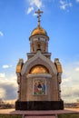 Old Christian church in Kemerovo with golden and gilded domes, b Royalty Free Stock Photo