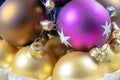 Old Christmas balls on a wooden table. Christmas decorations prepared for tuning the tree. Royalty Free Stock Photo