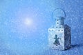 Old Christmas lantern with angels, stars ornaments on bright background. Royalty Free Stock Photo