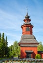 Old church bell tower next to cemetery Royalty Free Stock Photo