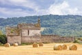 Old church in central Burgundy with heystack, France Royalty Free Stock Photo