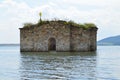 Old church engulfed in the water of dam lake