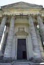 Old church facade with columns. Entrance in church Royalty Free Stock Photo