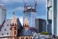 Old church in front of skyscrapers Royalty Free Stock Photo