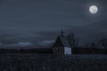 Old church in full moon night. Dobronice u Bechyne. Royalty Free Stock Photo