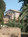 Ancient church inside a garden with ancient boundaries to Rome in Italy.