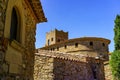 Old church and medieval stone houses in the tourist town of Pals, Girona, Spain. Royalty Free Stock Photo