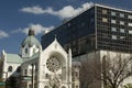 Old church and modern building Royalty Free Stock Photo