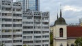 Old church and Modern resedential building. A combination of history and modernity