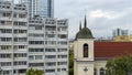 Old church and Modern resedential building. A combination of history and modernity.