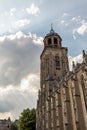 Old church of old dutch city Deventer under cloudy sky. Royalty Free Stock Photo