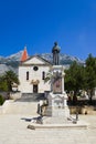 Old church and statue at Makarska, Croatia Royalty Free Stock Photo