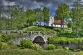 Old church and stone bridge in Sweden Royalty Free Stock Photo