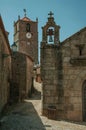 Old church with stone wall and steeple in Monsanto Royalty Free Stock Photo