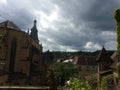 City and stormy sky and light