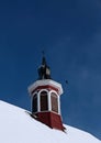 Old church tower against the blue sky Royalty Free Stock Photo