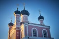 Old church on warm winter landscape of sunset blue sky Royalty Free Stock Photo