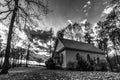 Old Church in woods with dramatic sky - monochrome Royalty Free Stock Photo