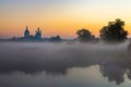 Old churches  at fog sunrise in Dunilovo Royalty Free Stock Photo