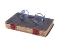 Old Circular Glasses on Ancient Book Royalty Free Stock Photo