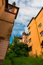 Old city buildings urban landmark view vertical picture with tower background roof top in summer vivid colorful day time Royalty Free Stock Photo