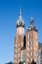 Old city center view with Adam Mickiewicz monument and St. Mary`s Basilica in Krakow Royalty Free Stock Photo