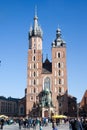Old city center view with Adam Mickiewicz monument and St. Mary`s Basilica in Krakow Royalty Free Stock Photo