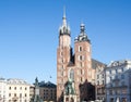 Old city center view with Adam Mickiewicz monument and St. Mary`s Basilica in Krakow Royalty Free Stock Photo