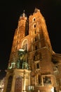 Old city center view with Adam Mickiewicz monument and St. Mary`s Basilica in Krakow at night Royalty Free Stock Photo