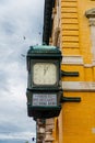 Old city clock on the wall of a historic building Royalty Free Stock Photo