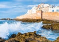 Old city of Essaouira in Morocco with walled medina and stormy waters Royalty Free Stock Photo