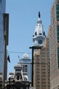 Old city hall among modern buildings Royalty Free Stock Photo