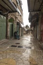 Old City of Jerusalem - Christian Quarter, empty street and square in the morning in rainy weather. Israel