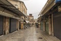 Old City of Jerusalem - Christian Quarter, empty street and square in the morning in rainy weather. Israel