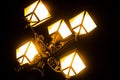 Old city lantern in the night. Old fashioned streetlight close up.