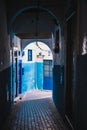 Old City/Medina Alley way with blue walls Royalty Free Stock Photo