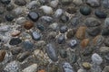 Old city pavement made of pebbles. Milan, Northern Italy, Europe Royalty Free Stock Photo