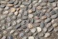 Old city pavement made of pebbles. Milan, Northern Italy, Europe Royalty Free Stock Photo