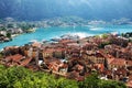 Old city and port of Kotor, turquoise water and boats