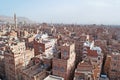 The Old City of Sana'a, decorated houses, palace, minarets and Mosque in the fog, Yemen Royalty Free Stock Photo