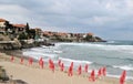 Old city Sozopol Bulgaria horizon sea panorama umbrellas beach waves sky clouds new season vacation nature background