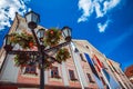 Old city streets traditional baltic tourism architecture house facades in historical part of town with stone road and colorful or