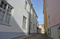 Old city streets traditional baltic tourism architecture house facades in historical part of town with stone road