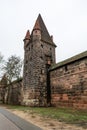 Old city wall with watch towers surrounding medieval city. Royalty Free Stock Photo