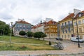 Old city. Warsaw Poland. Multicolored houses. Empty street without tourists. Warsaw, Poland - August 1, 2023.