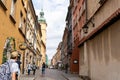 Old city. Warsaw Poland. Multicolored houses. Street with tourists. Warsaw, Poland - August 1, 2023.