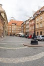 Old city. Warsaw Poland. Multicolored houses. Street with tourists. Warsaw, Poland - August 1, 2023.