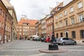 Old city. Warsaw Poland. Multicolored houses. Street with tourists. Warsaw, Poland - August 1, 2023.