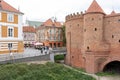 Old city. Warsaw Poland. Multicolored houses. Street with tourists. Warsaw, Poland - August 1, 2023.